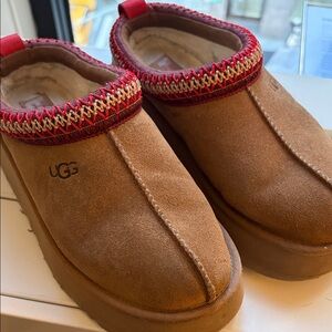 UGG Tan Suede Slip-Ons with Red Accents